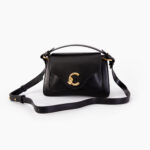 Bolso de mano y badolera negro COCCINELLE